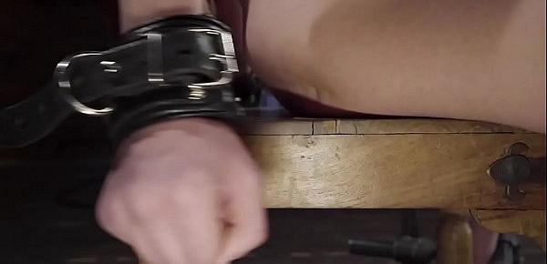  Slim slave is vibed in device bondage